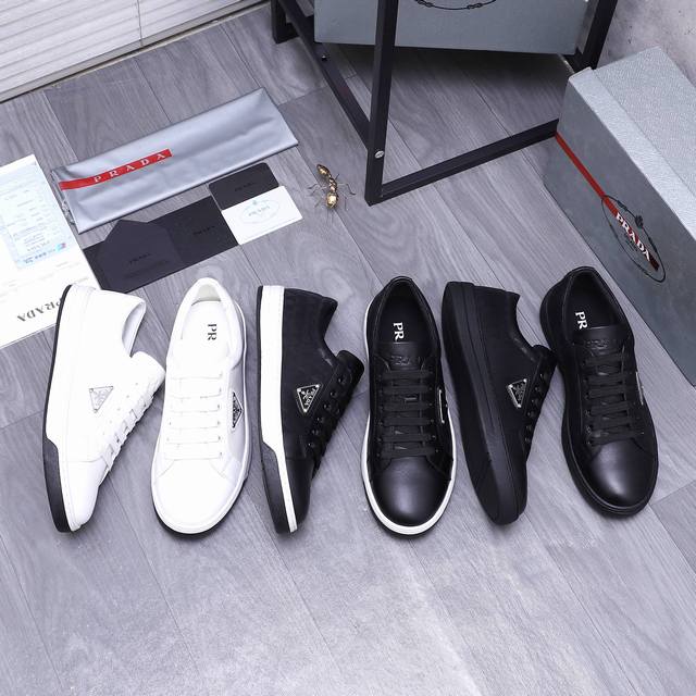 商品商标：Prada 普拉达 休闲鞋 正码码数: 38-45 商品材料：精选 头层牛皮拼接鞋面 牛皮内里 原版大底